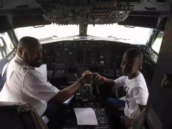 Young Son Of Former Aviation Minister Spotted In The Cockpit Of An Airplane (Photos)